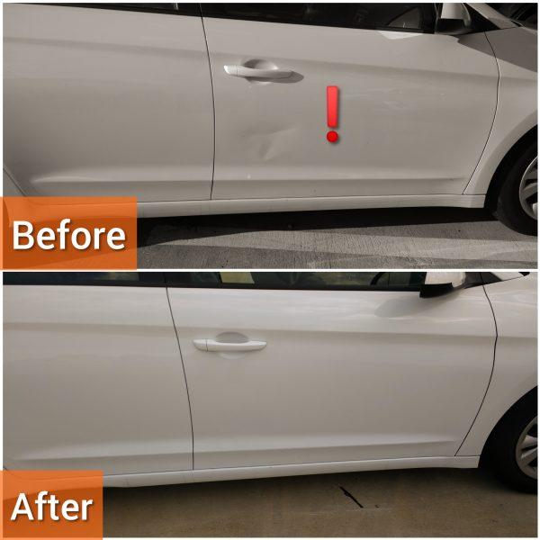 Isolated small dent visible on the white trunk panel of a vehicle before paintless dent repair