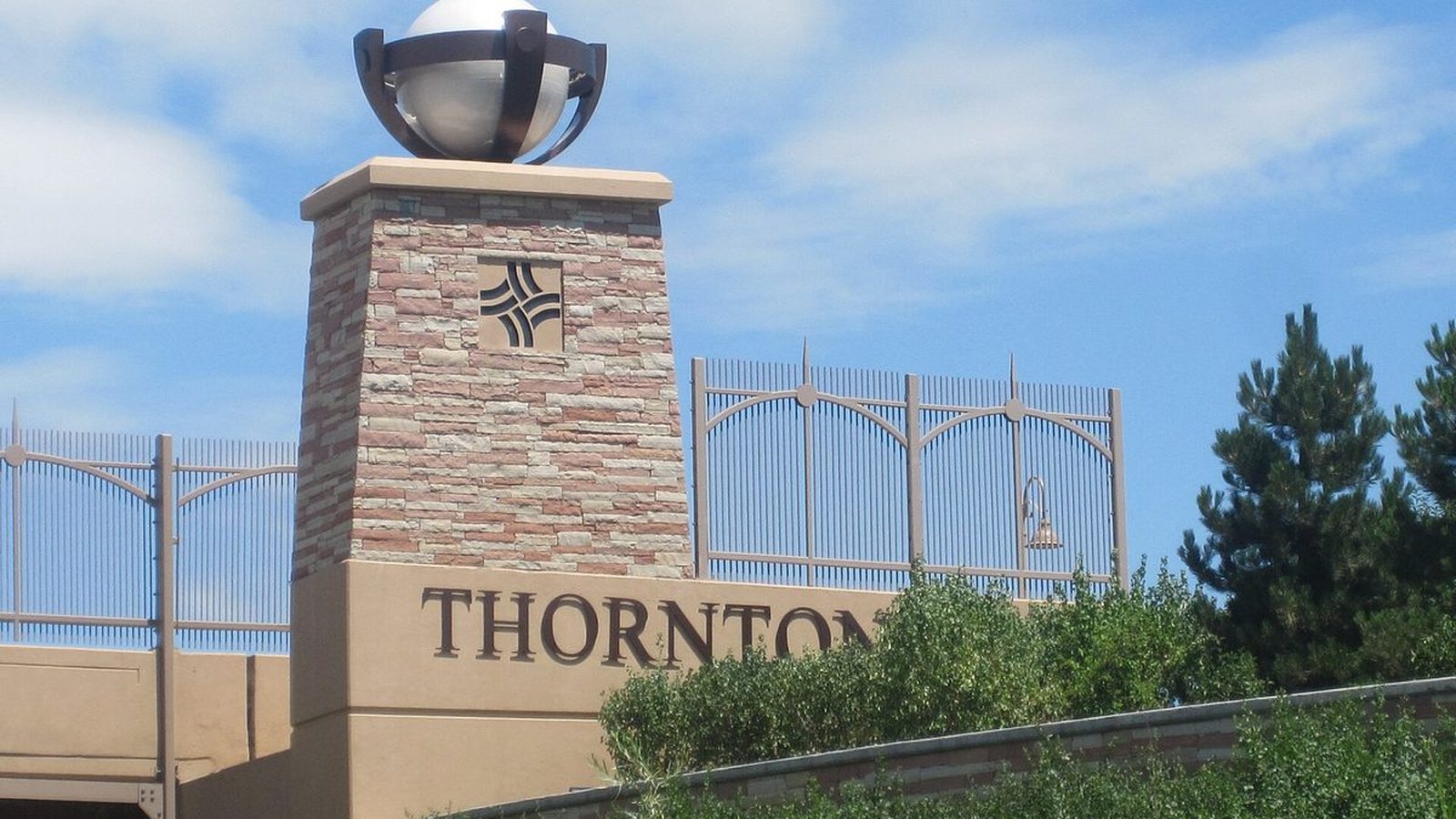 The Thornton, Colorado welcome monument beside the roadway